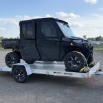 Side by Side Strapped on Aluminum Trailer