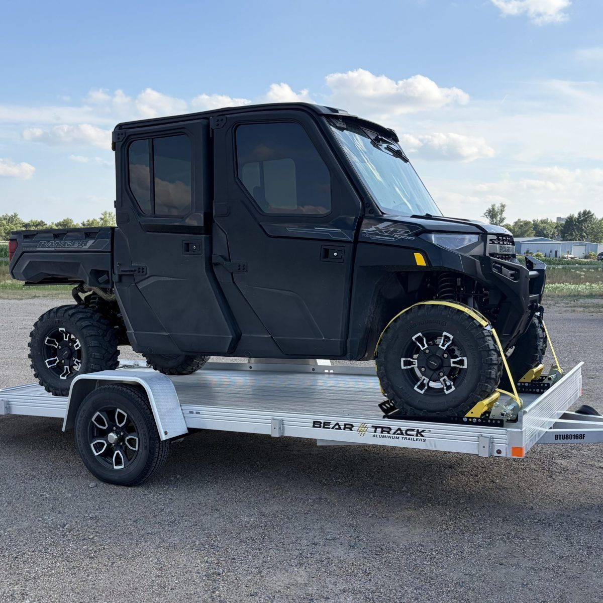 Side by Side Strapped on Aluminum Trailer