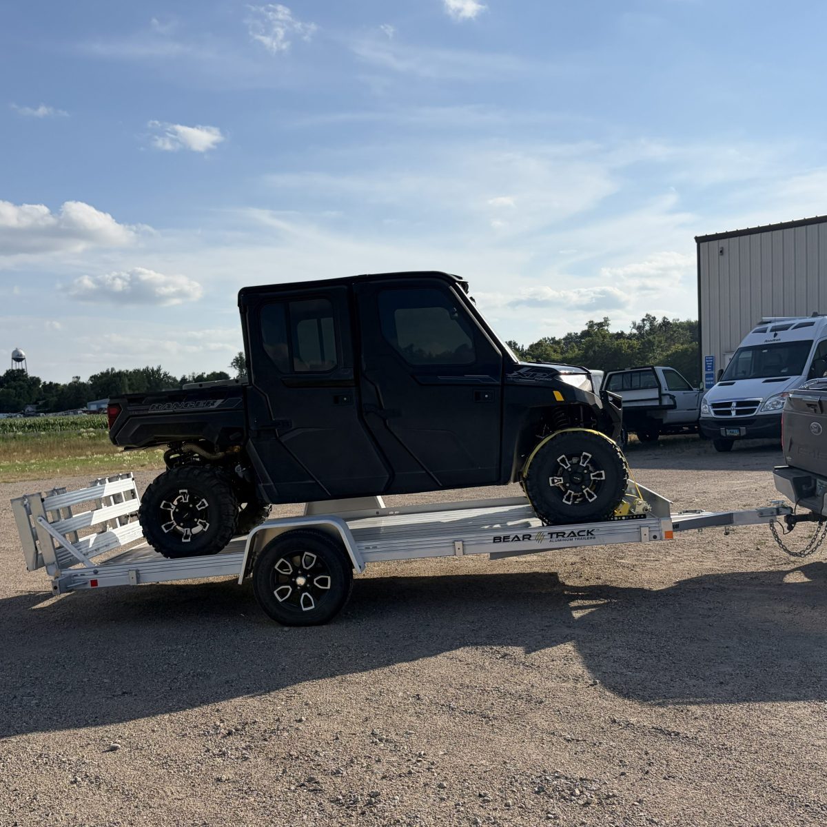 Side by Side Strapped on Trailer
