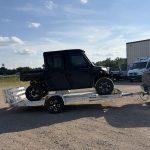 Side by Side Strapped on Trailer