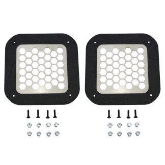 Two square black-framed air filters with white hexagonal honeycomb mesh and hardware (screws and washers) laid out below each filter on a white background.