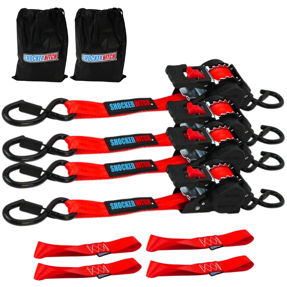 Four red Shocker retractable ratchet straps with black S-hooks, soft loops and storage bags on a white background